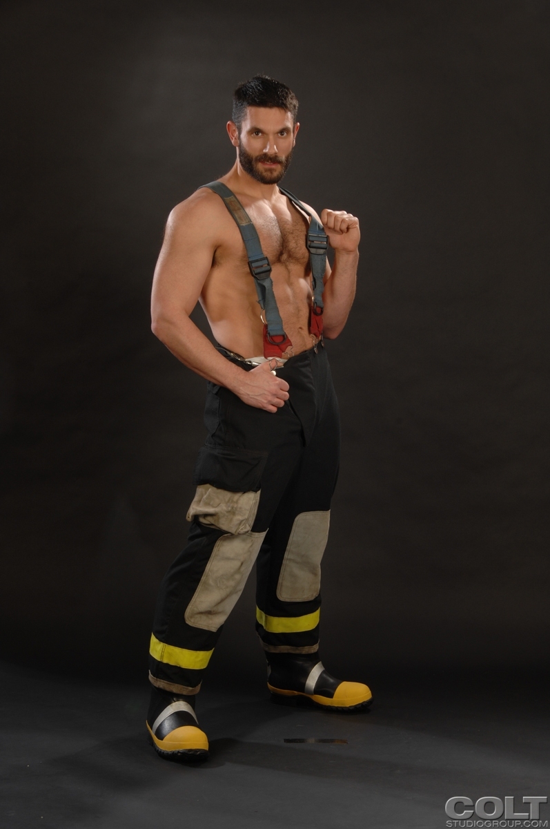 Big fireman shows his muscle naked body